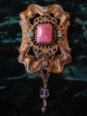 The Brooch Features A Buffed Oxidized Brass Frame Coated With Minwax Walnut Gel Stain. It Is Embellished With A Large Oxidized Brass Lace Filigree And Topped With A Vintage 25x18 Octagon Pink Moonstone Rhinestone.
